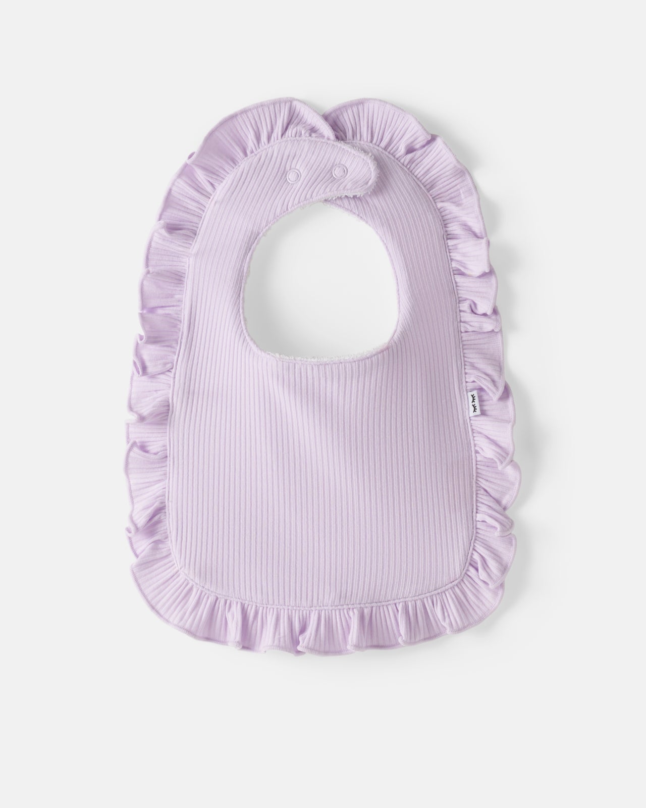 Flay lay of the Misty Lavender Ribbed Ruffle Bib