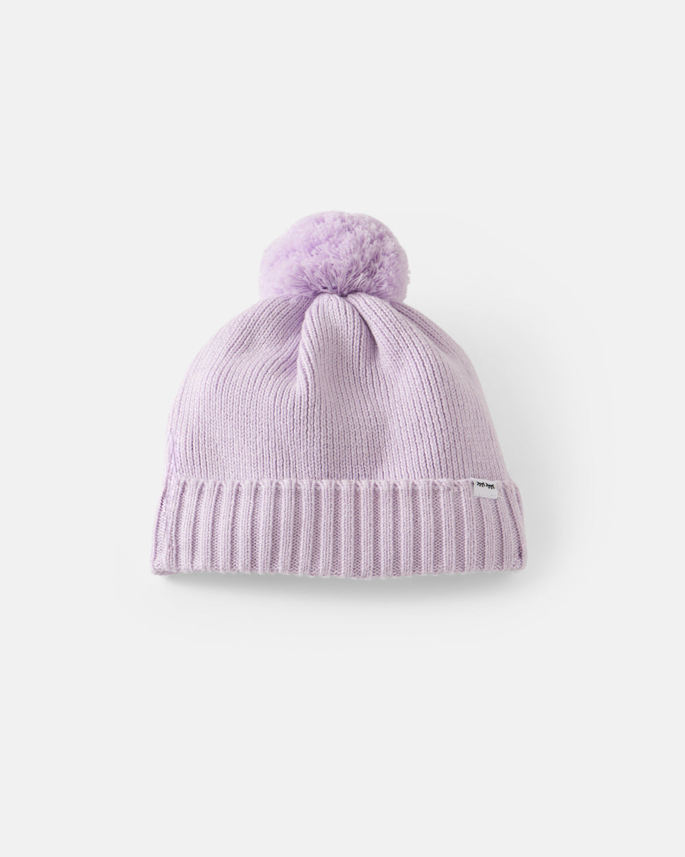 Flat lay of the Misty Lavender Sweater Beanie Hat
