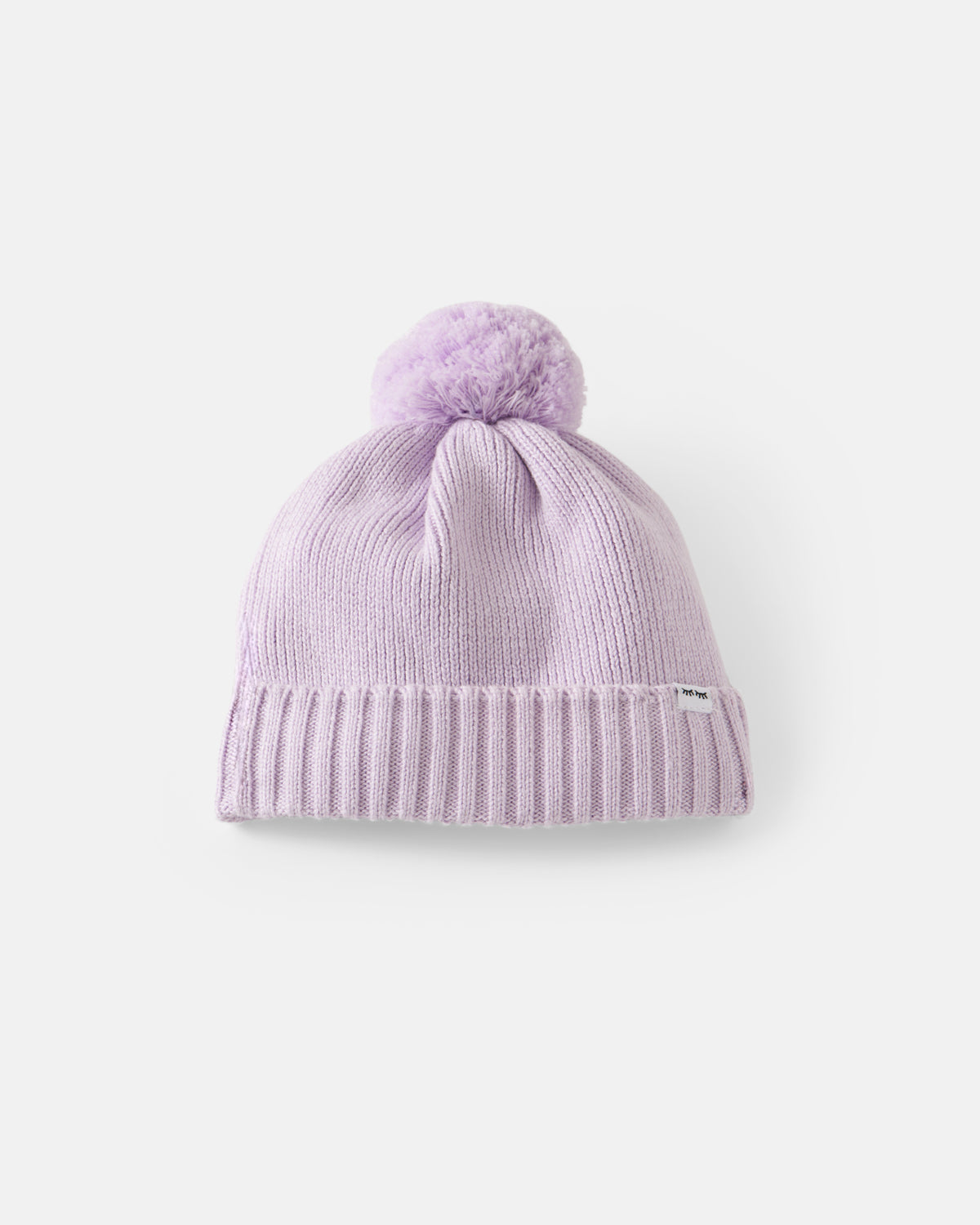 Flat lay of the Misty Lavender Sweater Beanie Hat