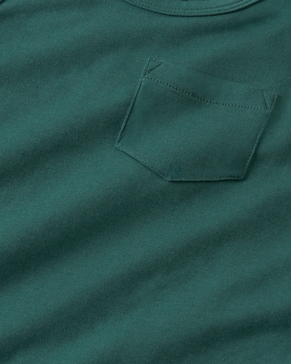 Close up of the pocket detail on the Muted Spruce Pocket Tank