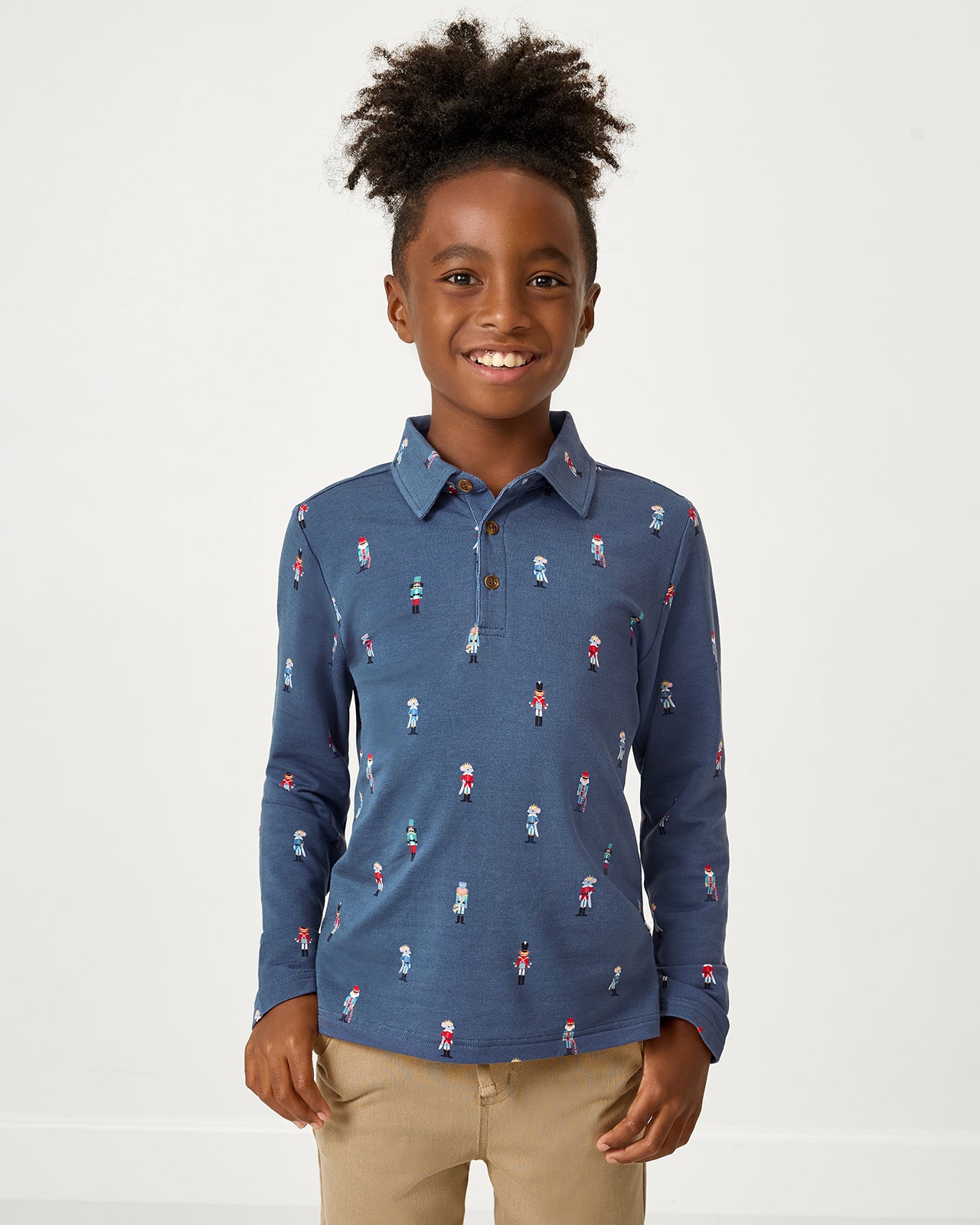 Boy wearing the Nutcracker March Polo Shirt