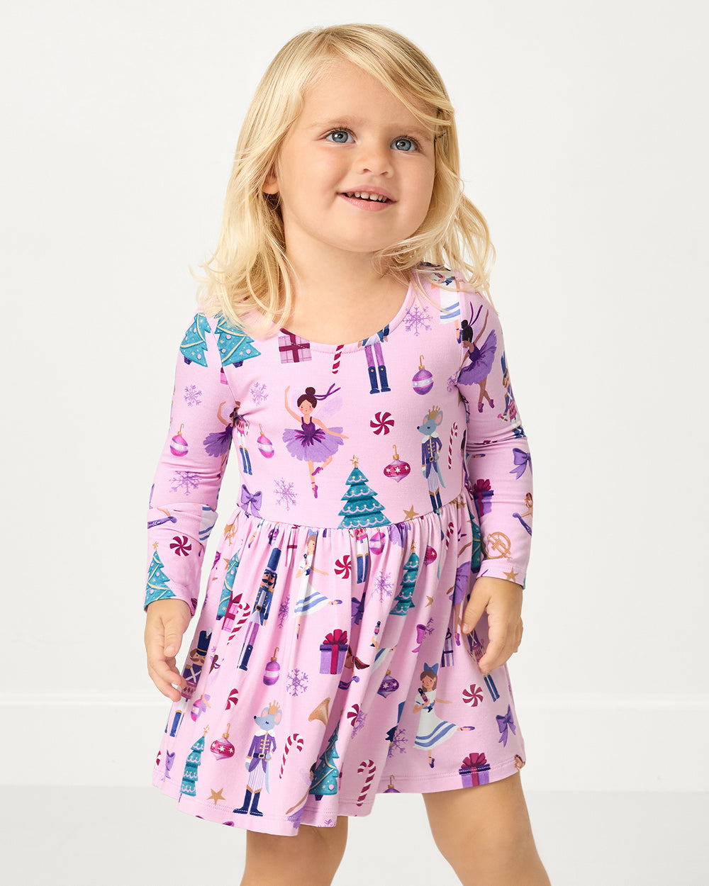 Alternate girl wearing the Nutcracker Ballet Bow Back Skater Dress with Bodysuit