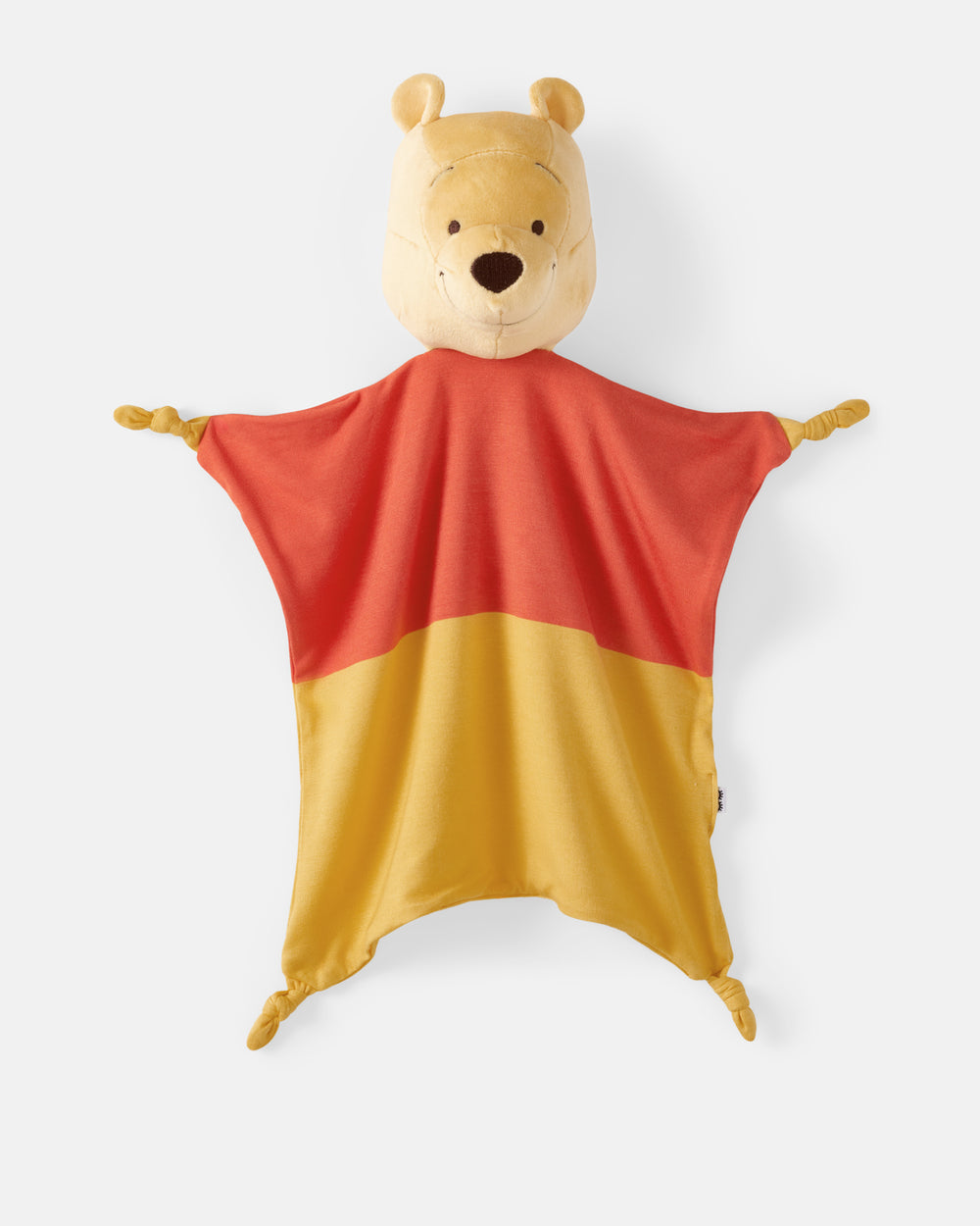 A Winnie the Pooh comforter blanket featuring a plush bear head and wings, with a color-blocked design in red and yellow, shown against a light gray background.