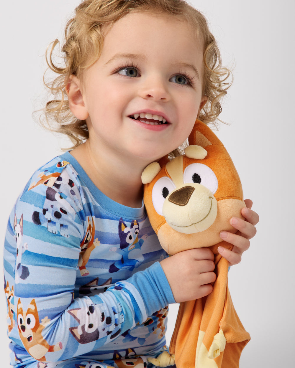 Child holding the Bingo Lovey