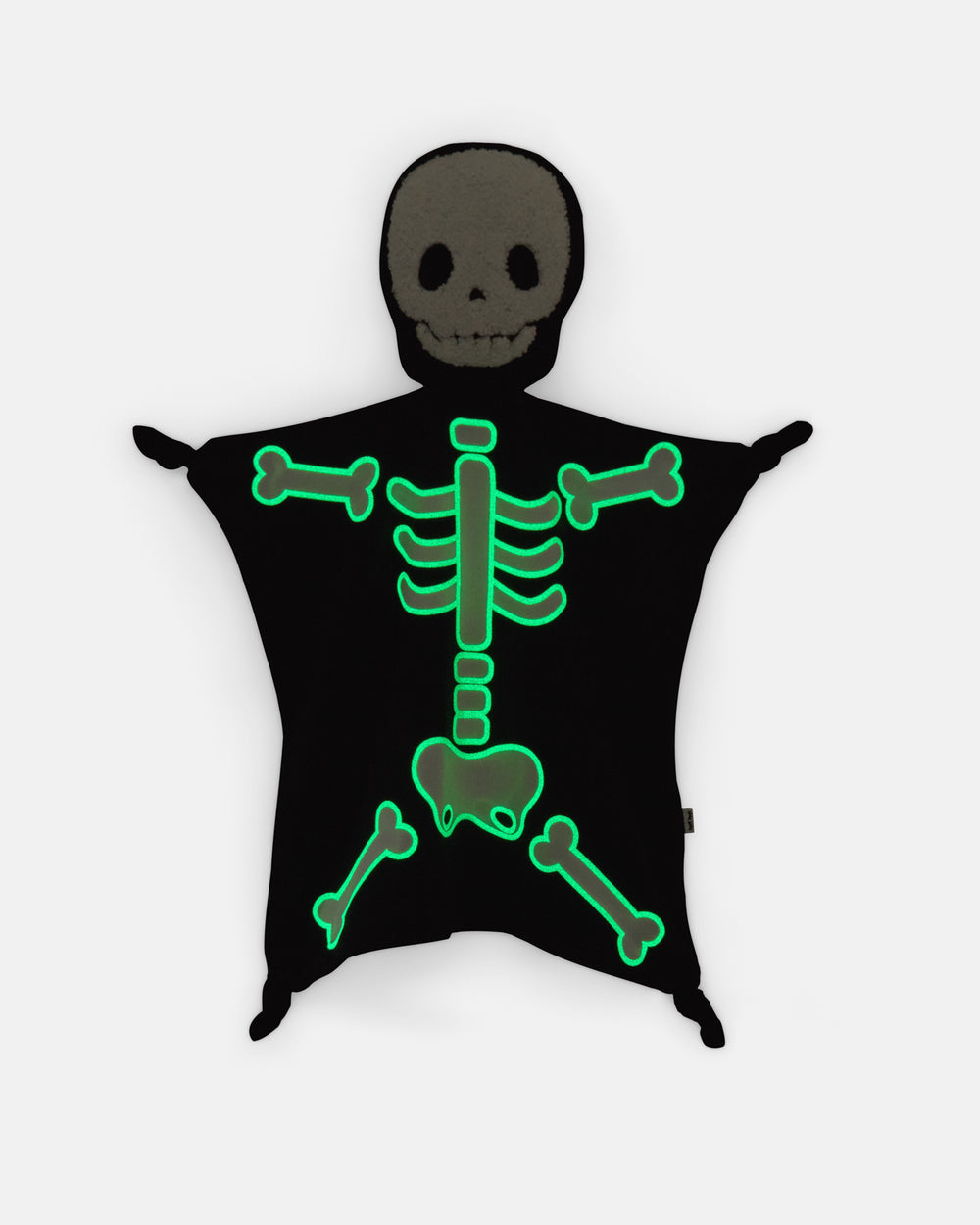Flat lay of the glow in the dark Skeleton Sleepyhead Lovey