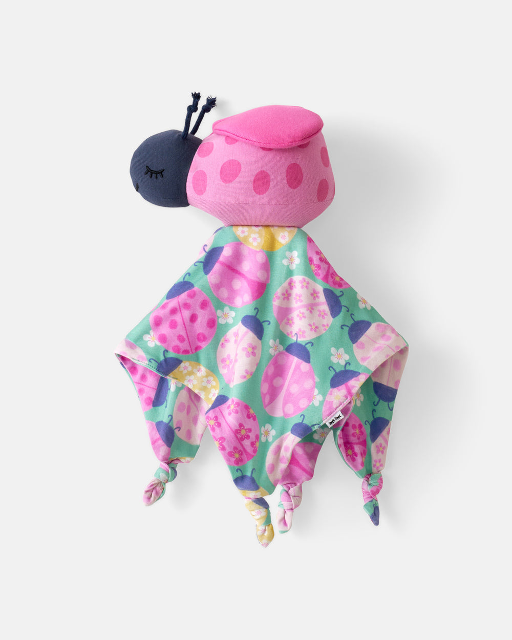 Flat lay of the Rosie the Ladybug Sleepyhead Lovey
