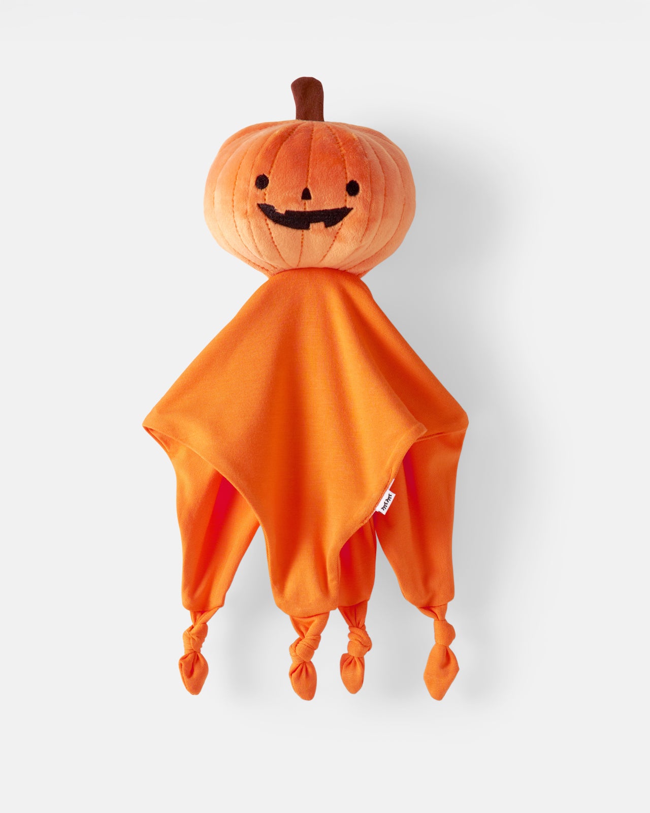 Flat lay of the Pumpkin Sleepyhead Lovey