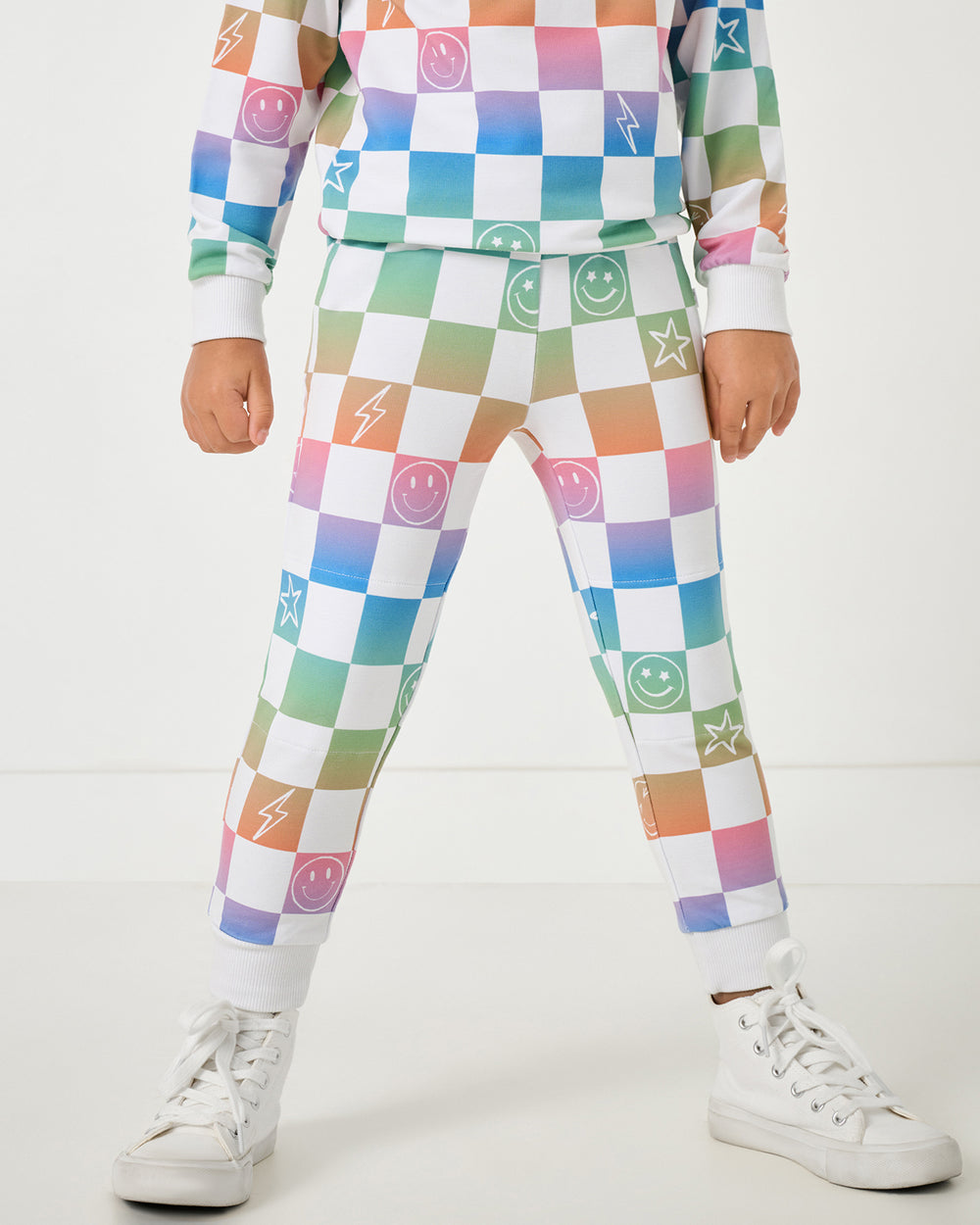 Close up of child wearing the Ombre Cheery Checks Jogger