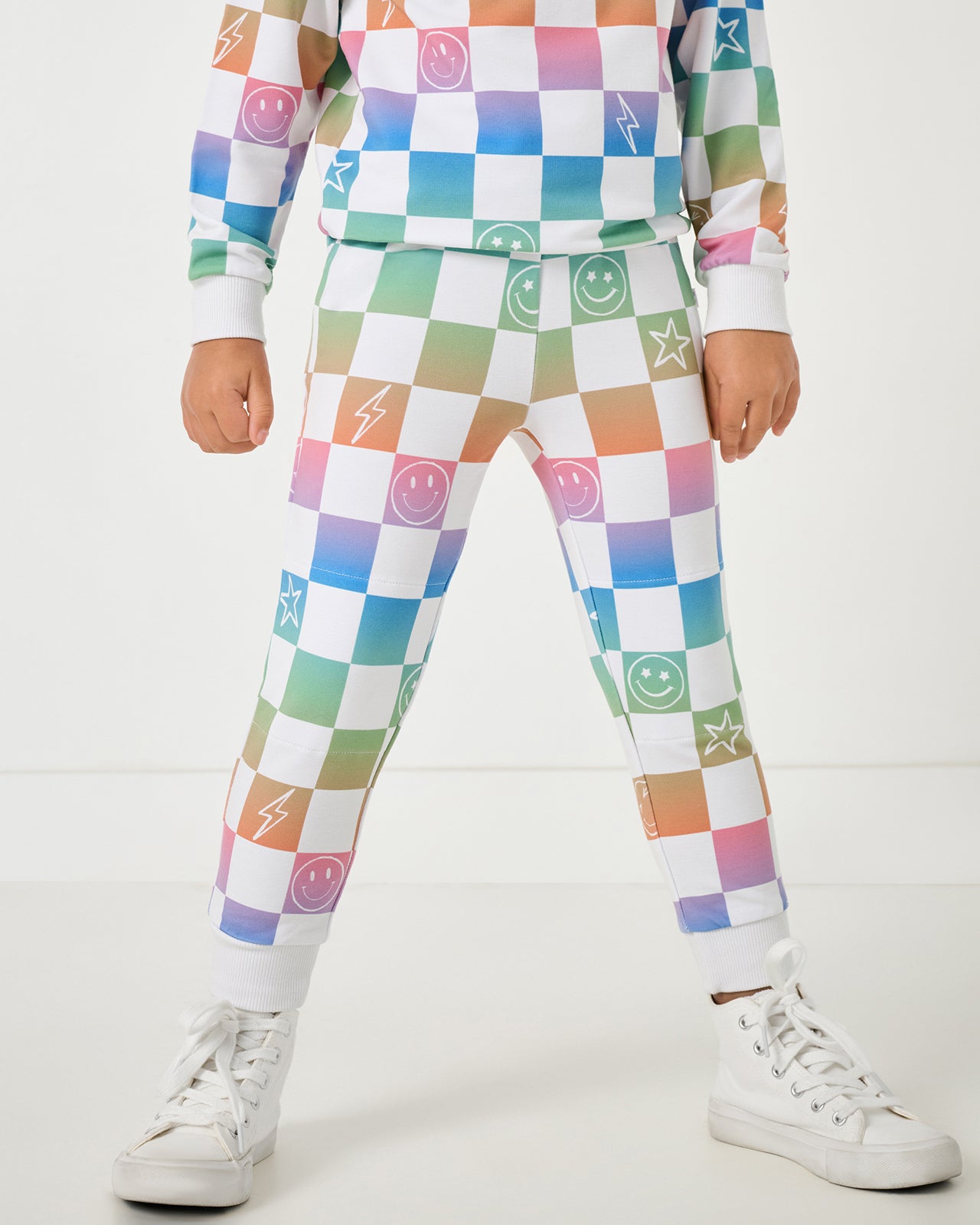 Close up of child wearing the Ombre Cheery Checks Jogger