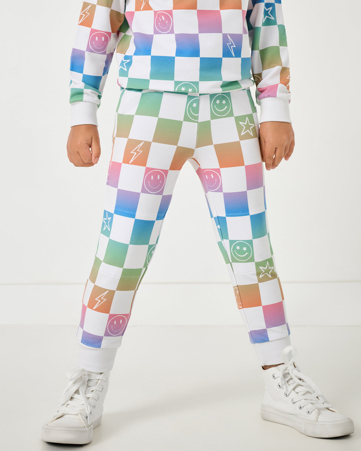 Close up of child wearing the Ombre Cheery Checks Jogger