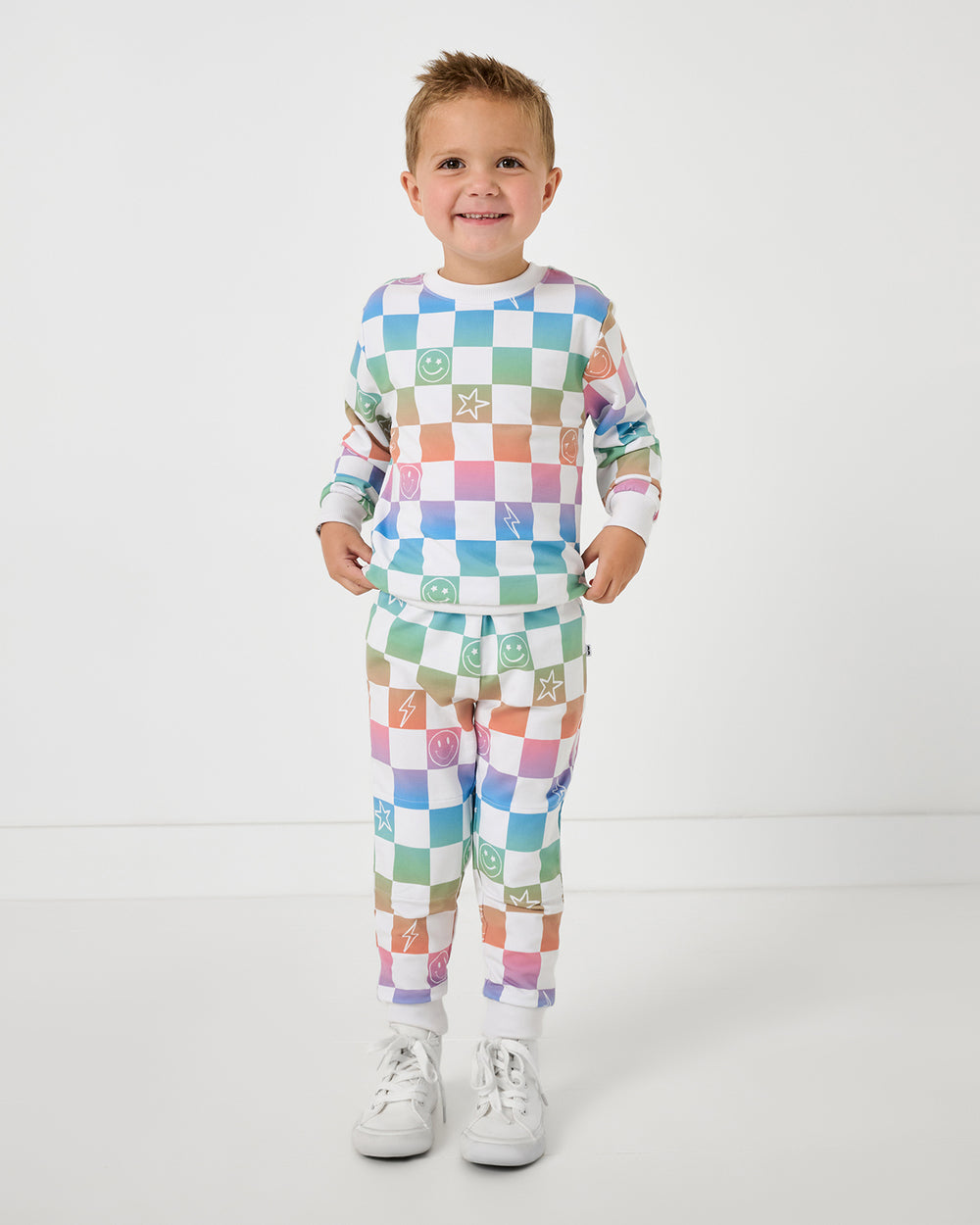 Boy wearing the Ombre Cheery Checks Jogger and Crewneck