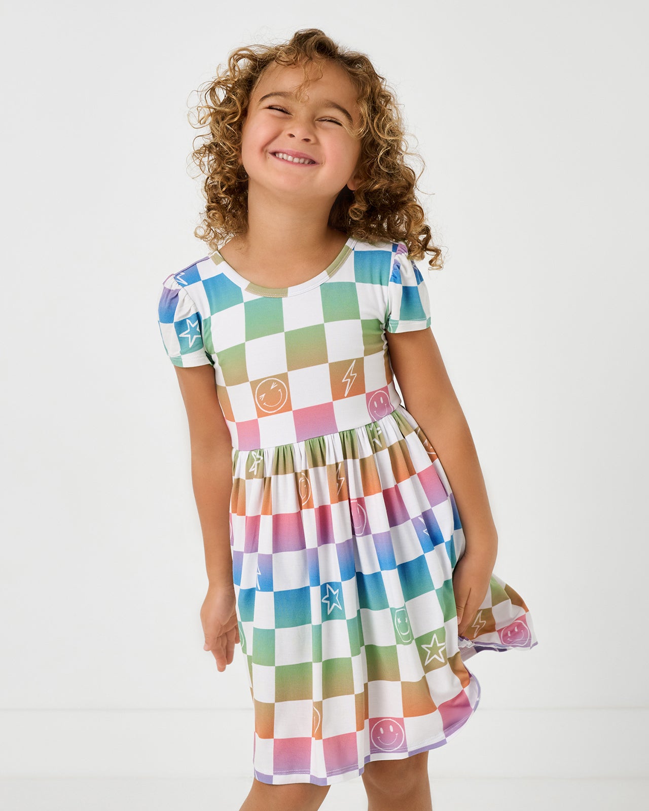 Girl wearing the Ombre Cheery Checks Skater Dress