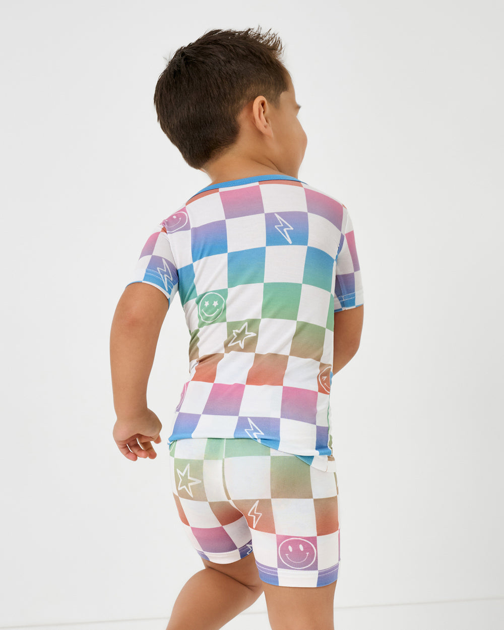 Back view of boy wearing the Ombre Cheery Checks Two-Piece Short Sleeve & Shorts Pajama Set