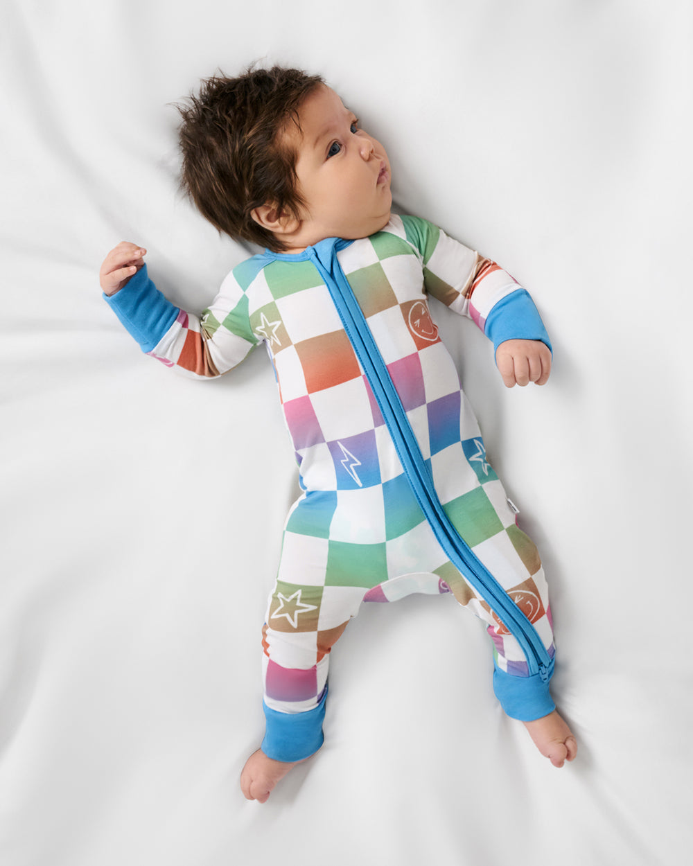 Aerial view of baby wearing the Ombre Cheery Checks Zippy