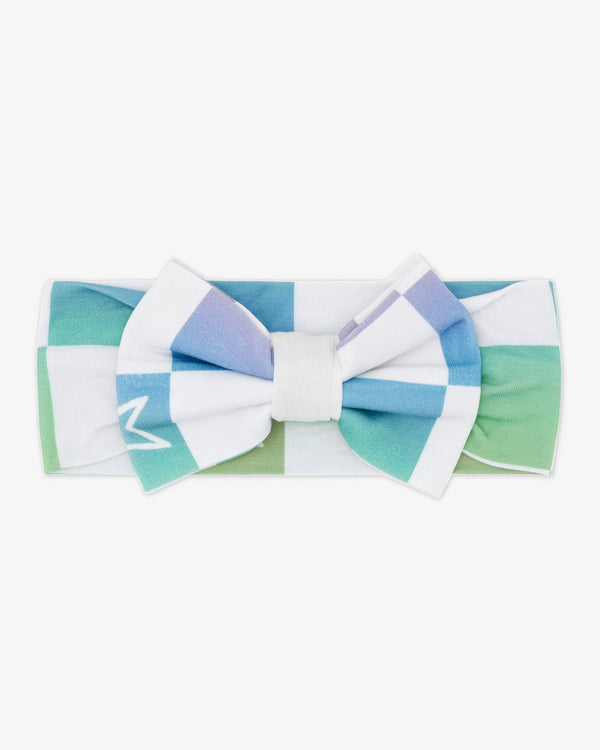 Flat lay of the Ombre Cheery Checks Luxe Bow Headband