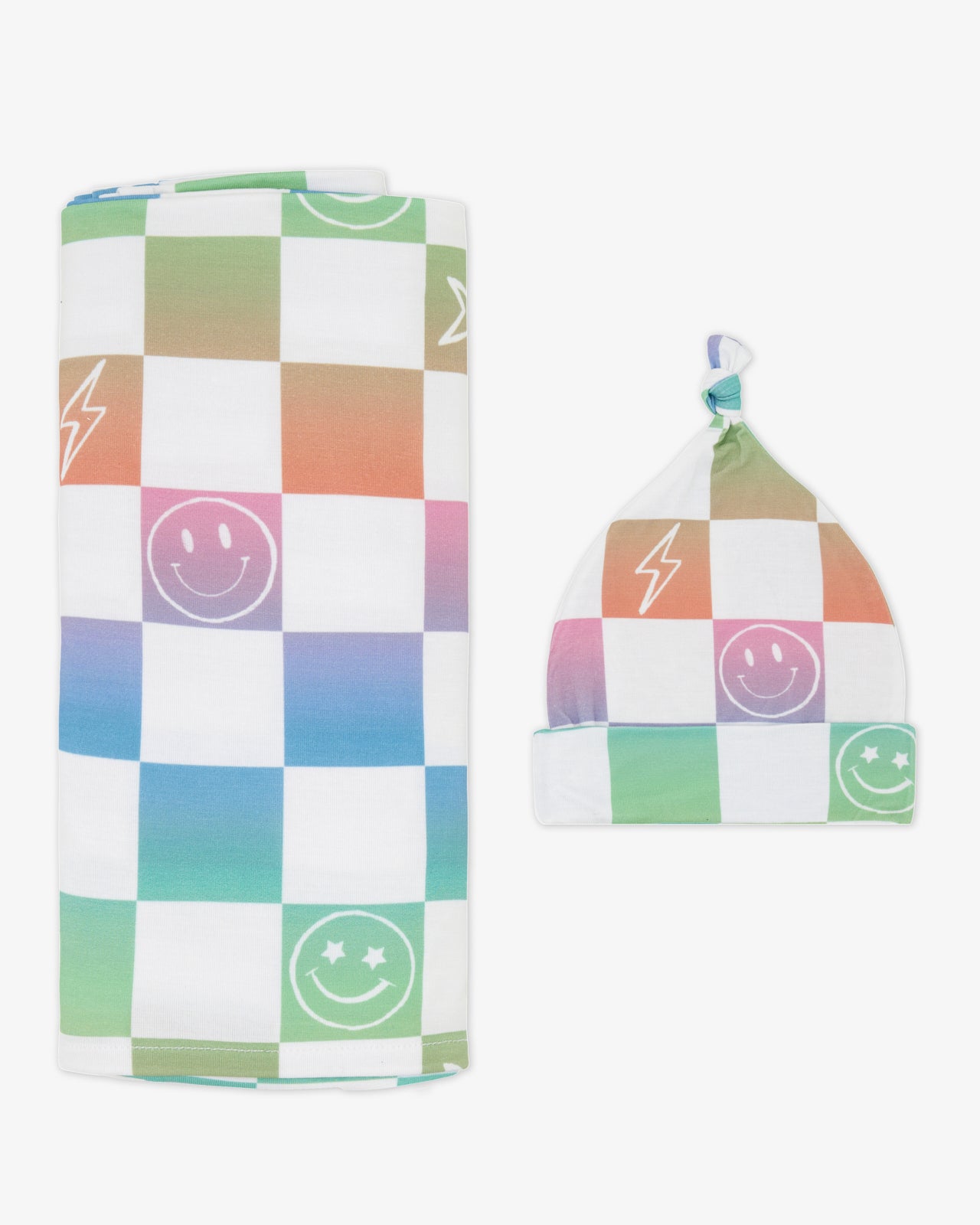 Flat lay of the Ombre Cheery Checks Swaddle & Hat Set
