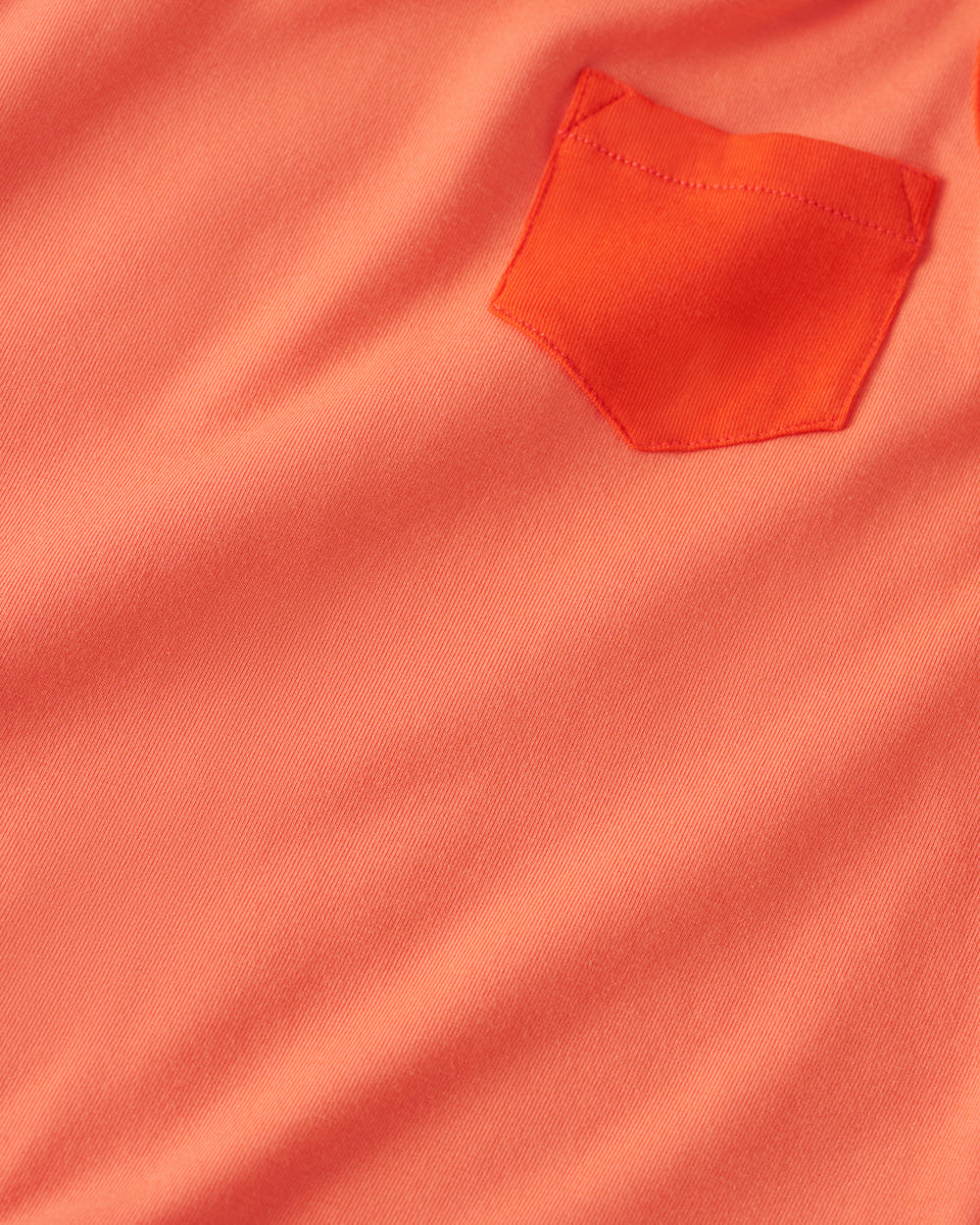 Close up of the pocket detail on the Orange Crush Pocket Tank
