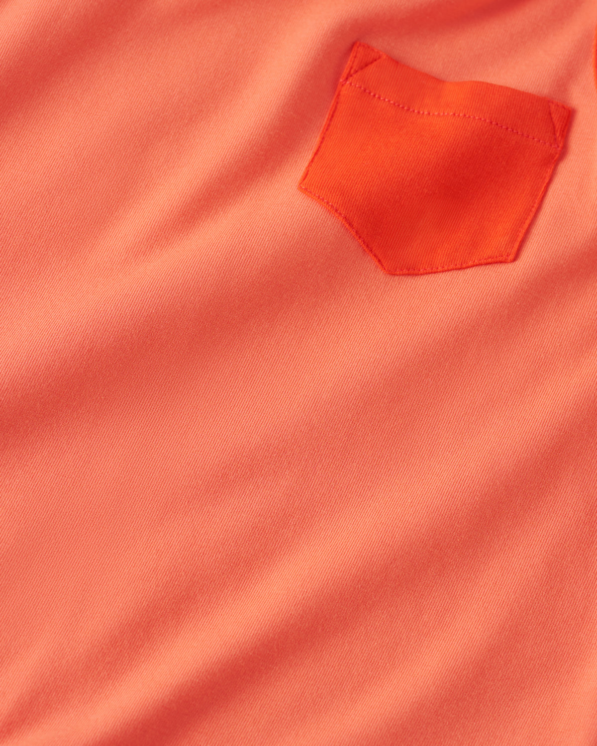 Close up of the pocket detail on the Orange Crush Pocket Tank