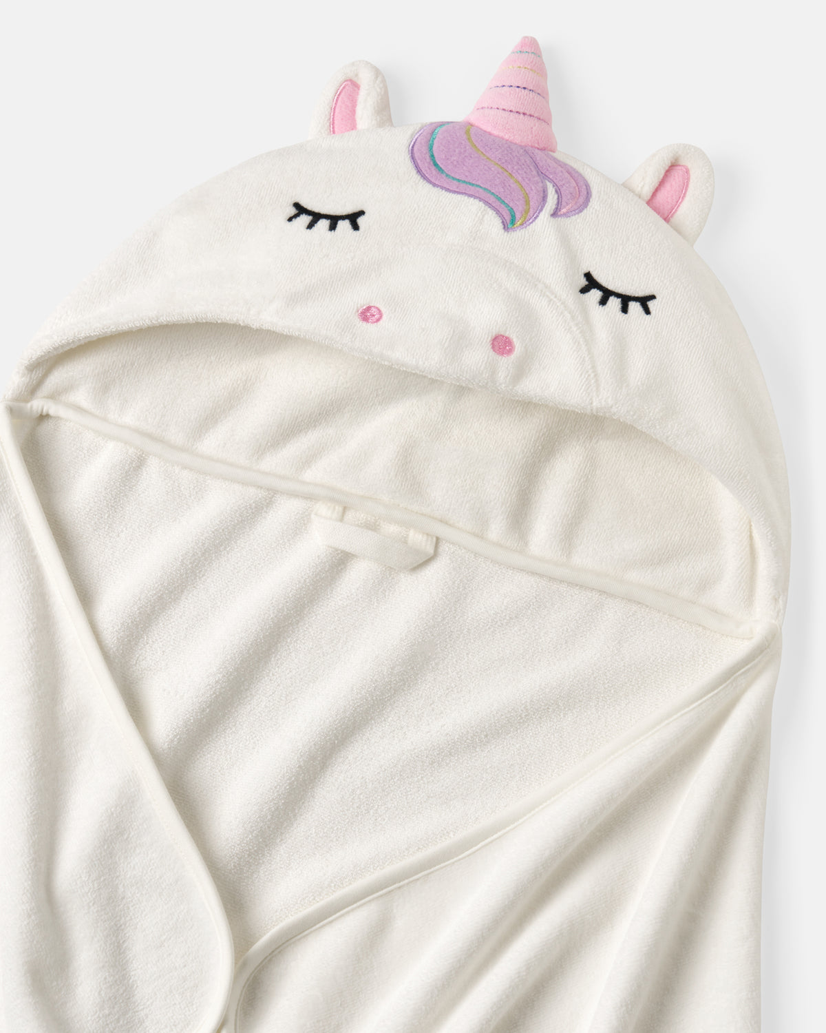 Close up of the unicorn details on a kids hooded bath towel