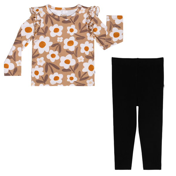 flat lay composite of a daisy daydream flutter tee and black legging