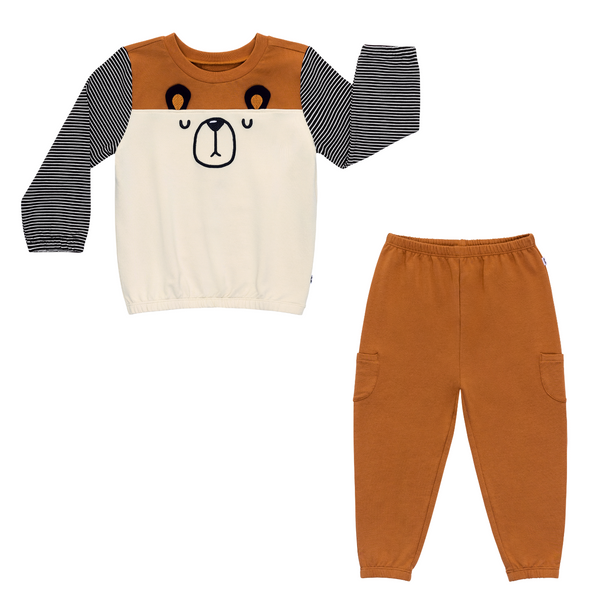 flat lay composite of an arctic cinched panel crewneck and golden brown cinched jogger