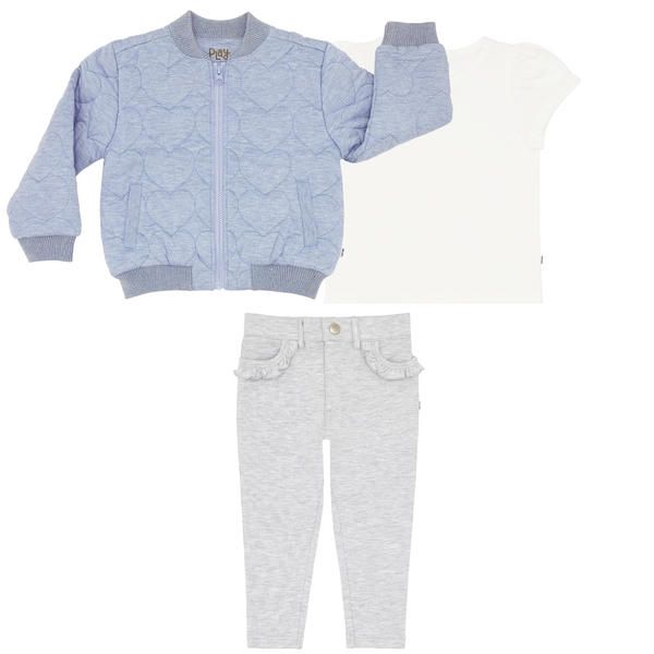 Flat lay composite of a light blue denim quilted varsity jacket, soft white puff sleeve tee, and light heather gray ruffle heart pocket pants