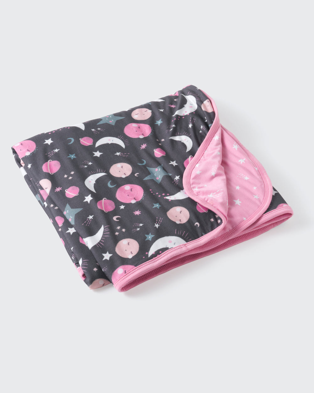 Flat lay of the Pink To the Moon & Back Large Cloud Blanket®