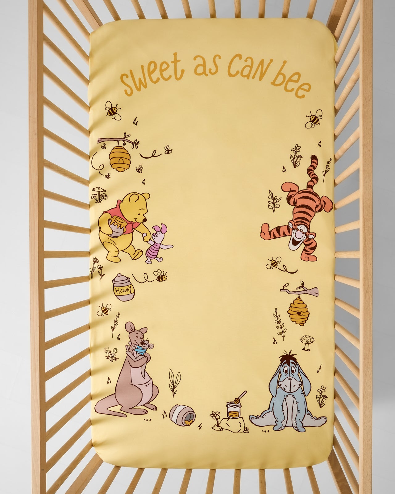 Aerial view of the Disney Sweet As Can Bee Fitted Crib Sheet