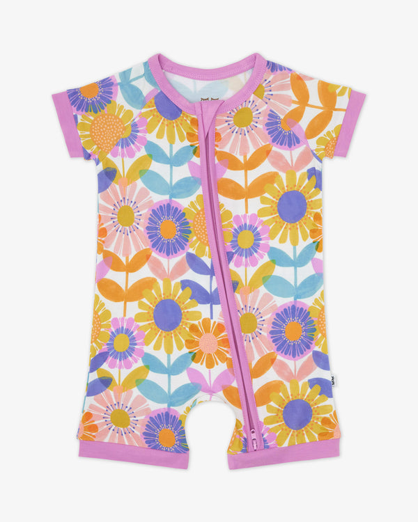 Flat lay of the Petal Power Shorty Zippy