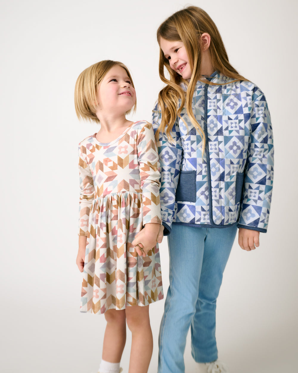 Two girls wearing Patchwork Indigo and Kaleidoscope Dreams styles