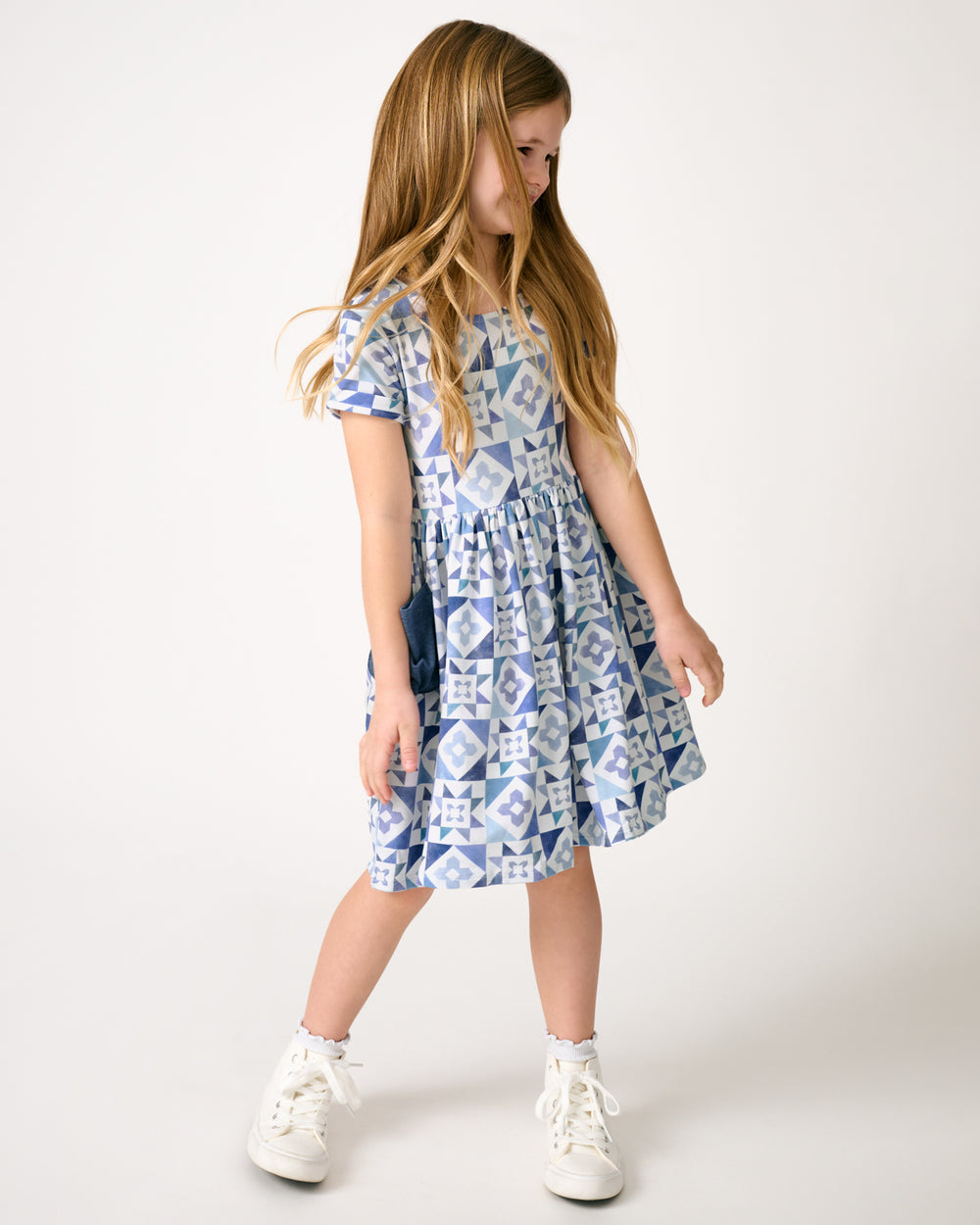 Girl wearing the Patchwork Indigo Patch Pocket Dress