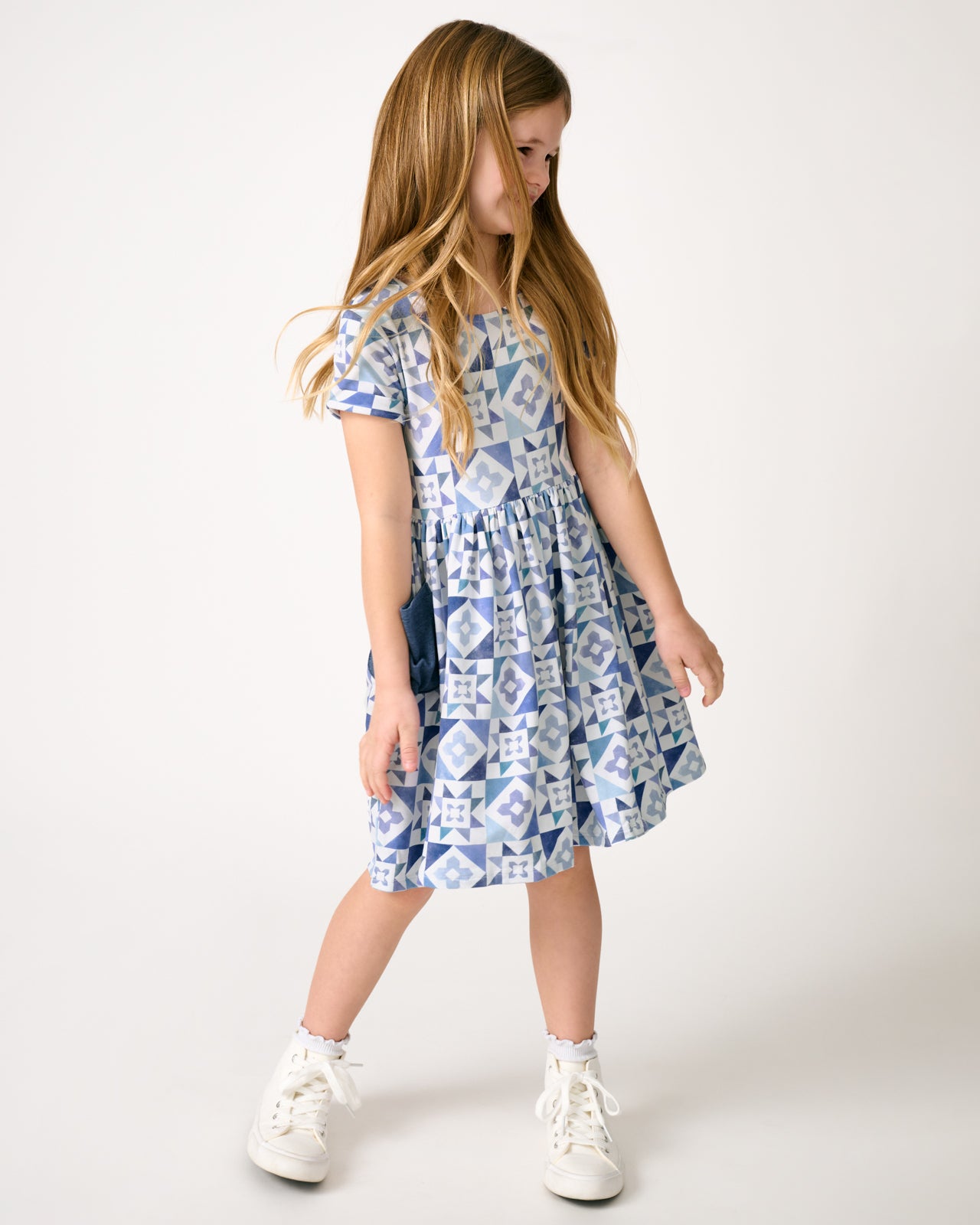 Girl wearing the Patchwork Indigo Patch Pocket Dress