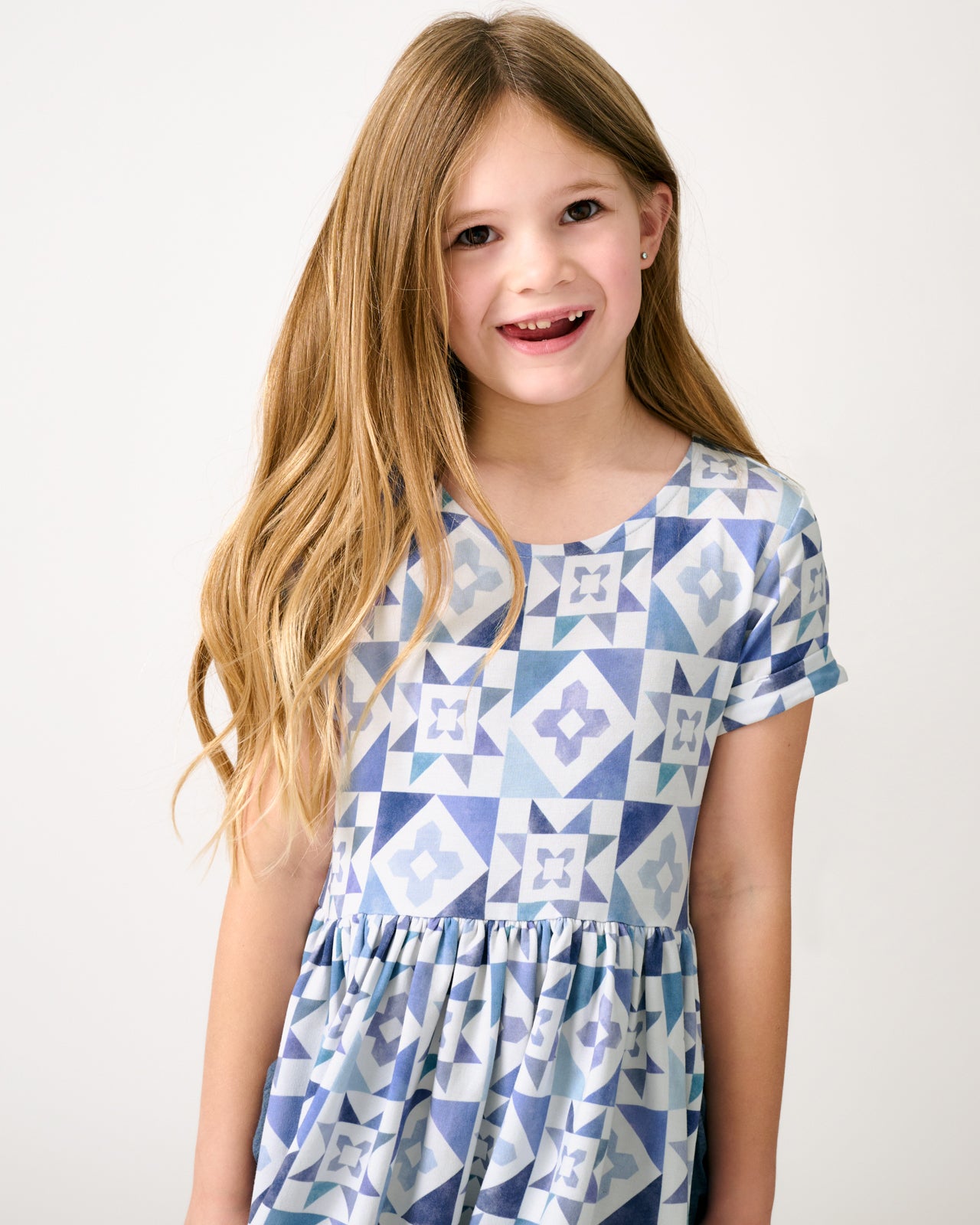 Close up of girl wearing the Patchwork Indigo Patch Pocket Dress