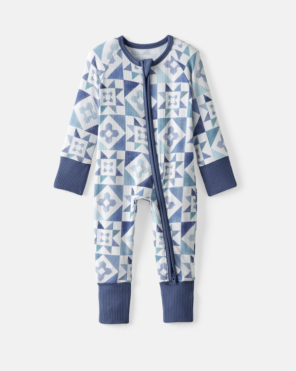 Flat lay of the Patchwork Indigo zippy