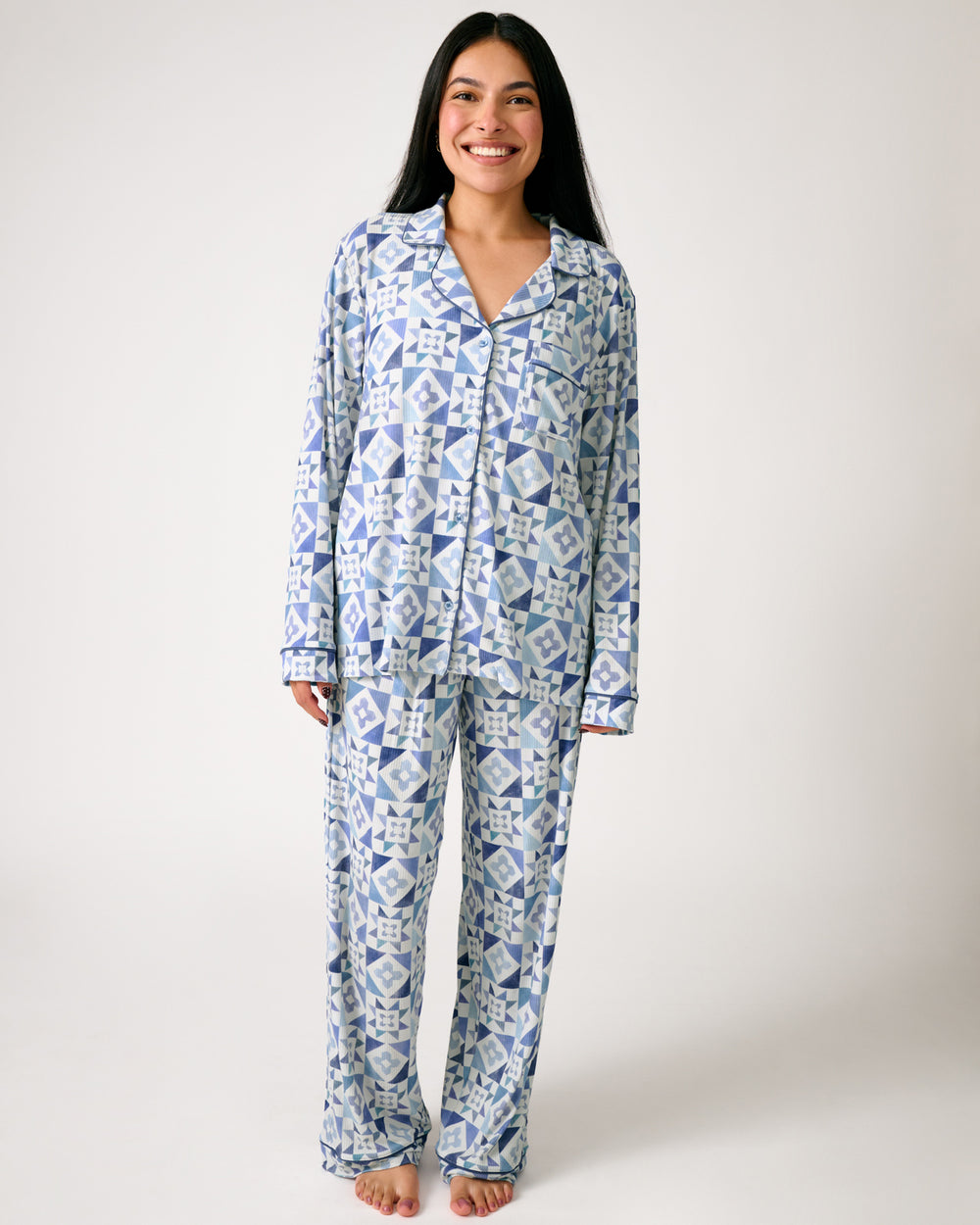 Standing woman wearing the Patchwork Indigo Women's Ribbed Pajama Set