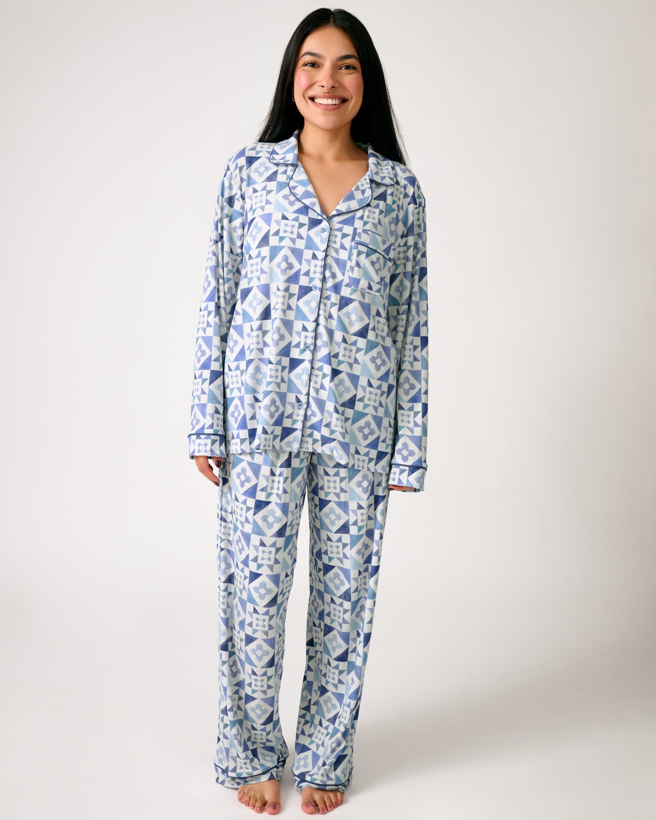 Standing woman wearing the Patchwork Indigo Women's Ribbed Pajama Set