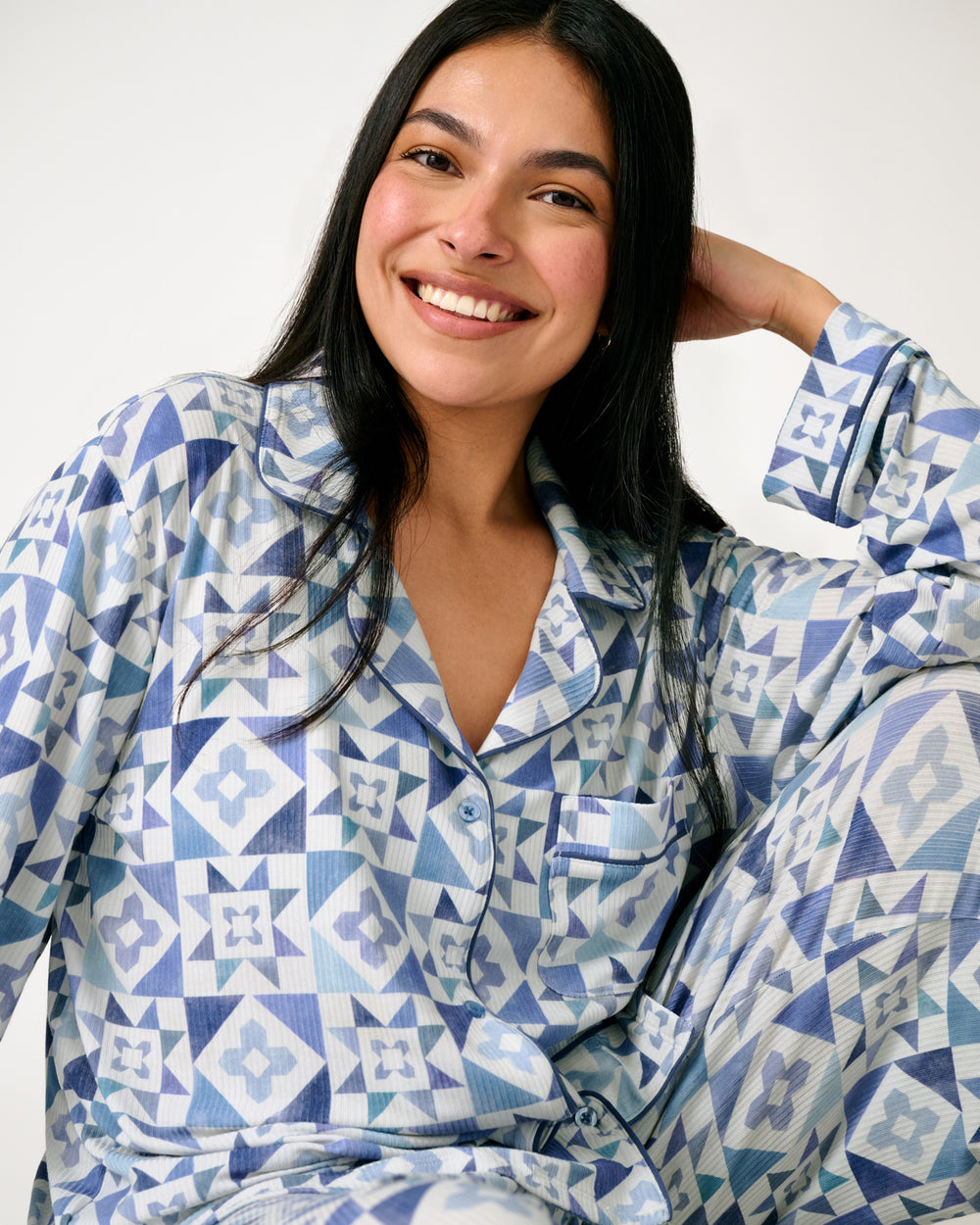 Sitting woman wearing the Patchwork Indigo Women's Ribbed Pajama Set