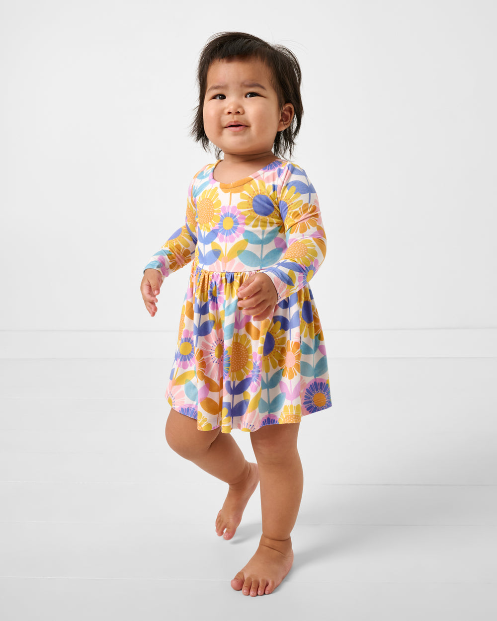 Alternate girl wearing the Petal Power Bow Back Skater Dress with Bodysuit