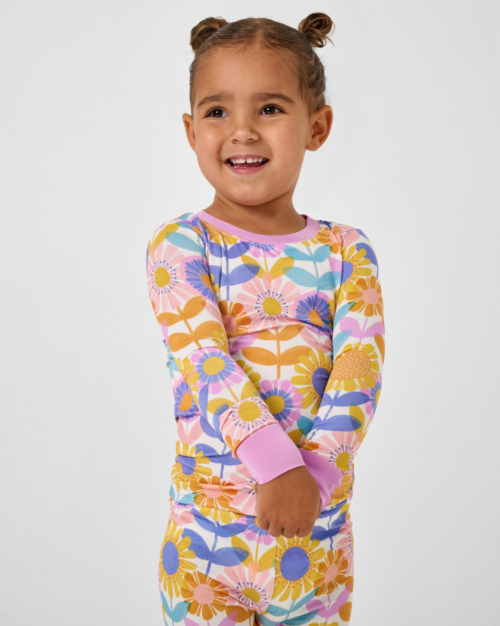 Close up of girl wearing the Petal Power Two-Piece Pajama Set