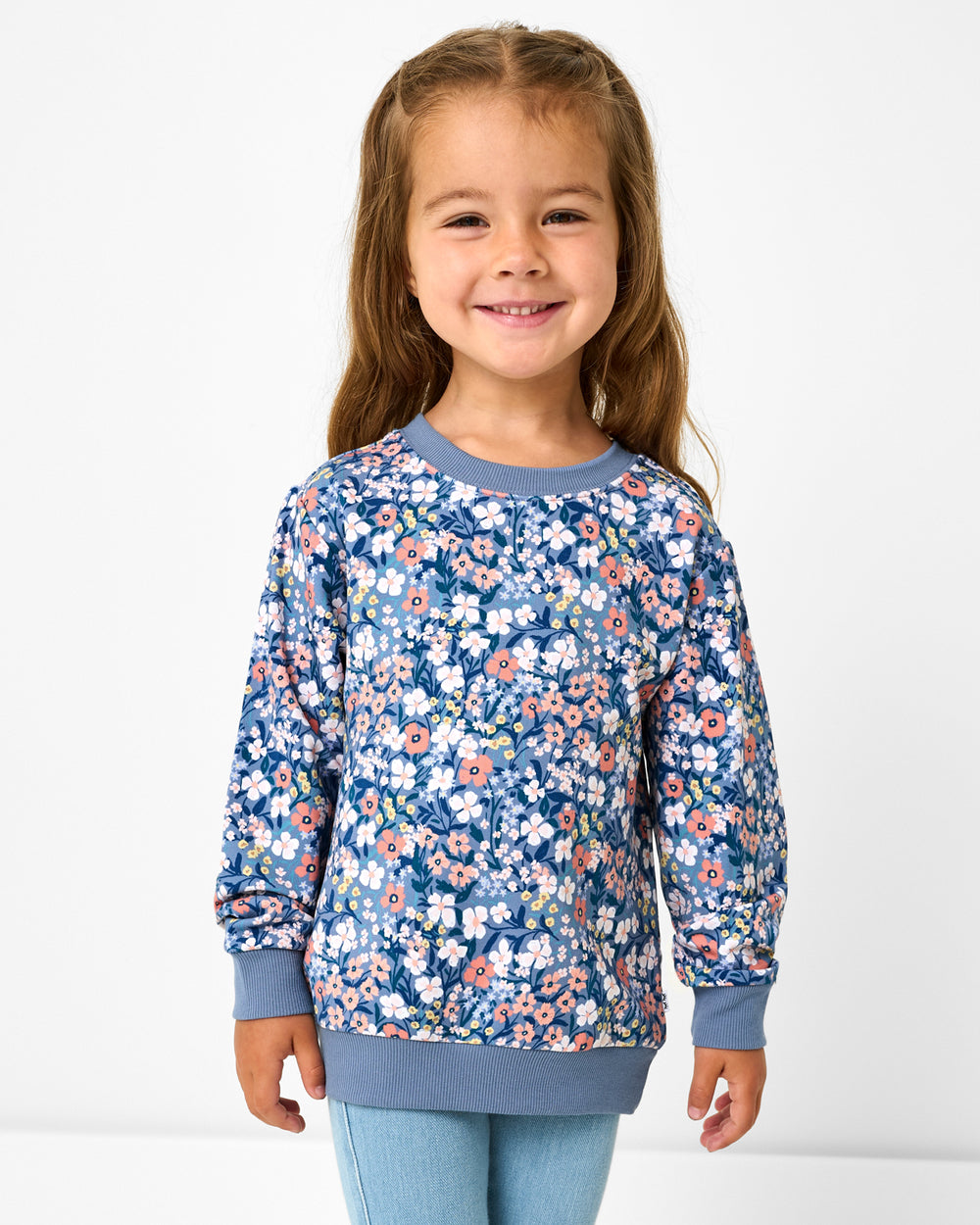 Girl wearing the Petite Petals Crewneck Sweatshirt