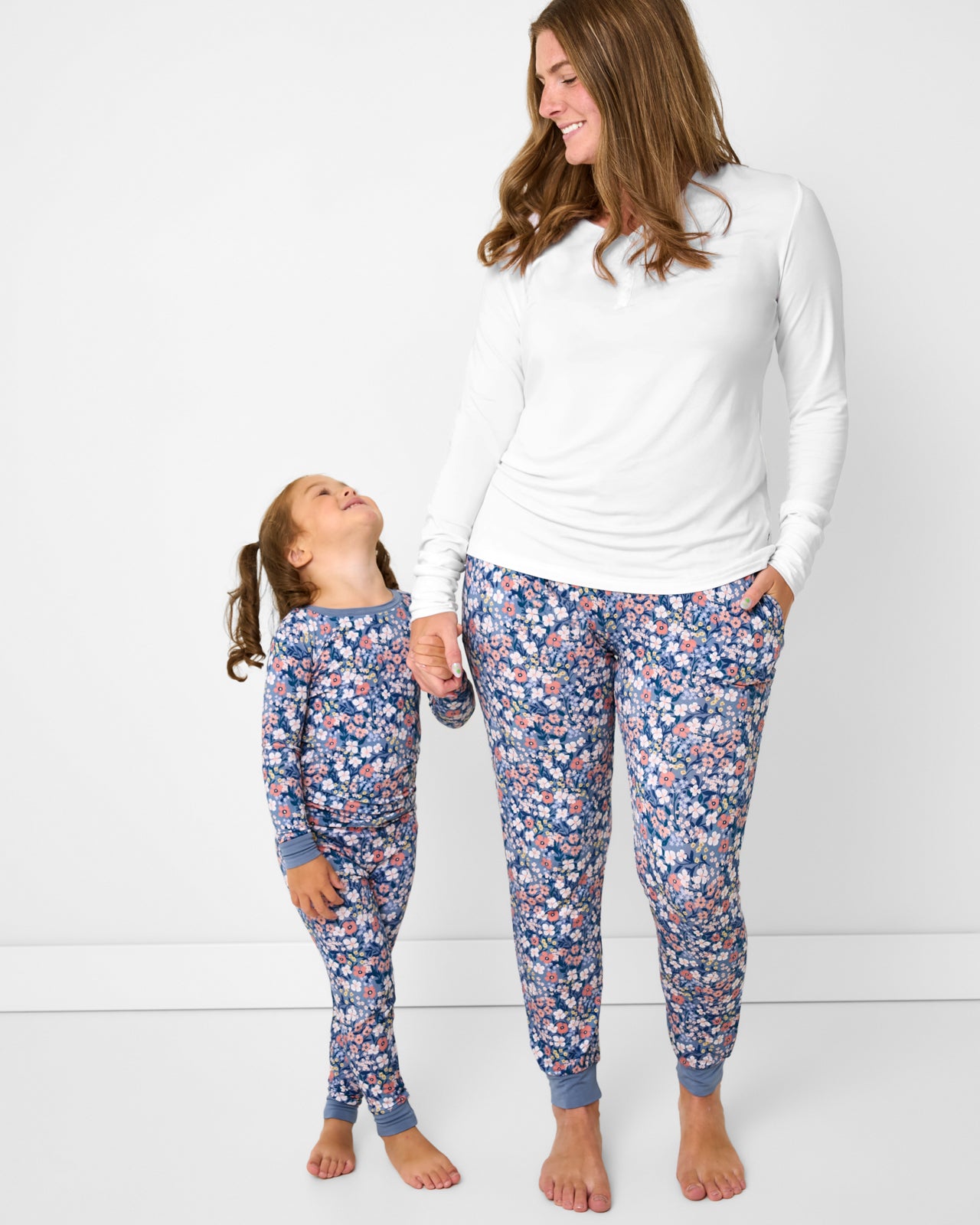 Woman and child wearing Petite Petals floral pajamas
