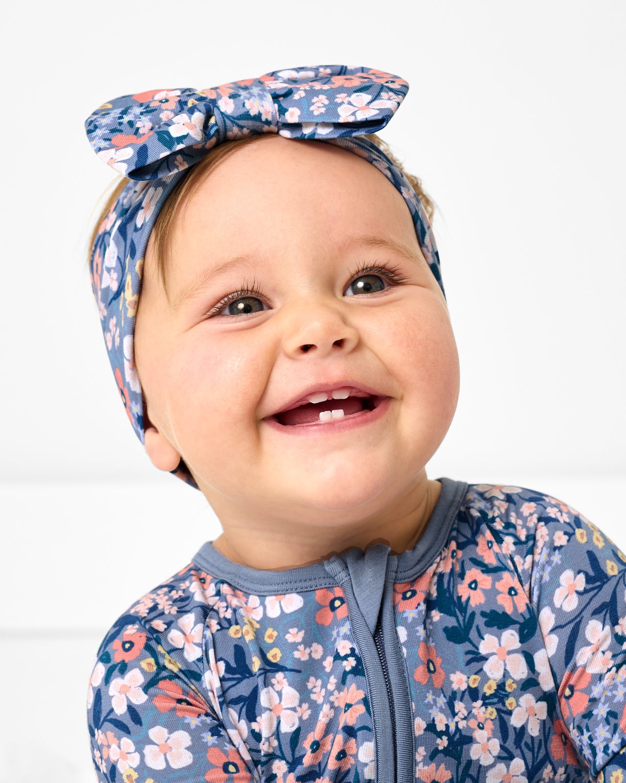 Alternate close up of baby wearing the Petite Petals Luxe Bow Headband