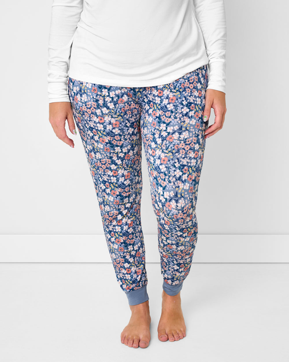 Woman wearing the Petite Petals Women's Pajama Pants