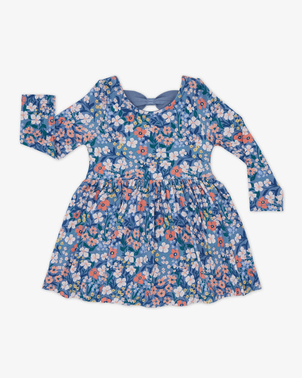 Flat lay of the Petite Petals Bow Back Skater Dress with Bodysuit