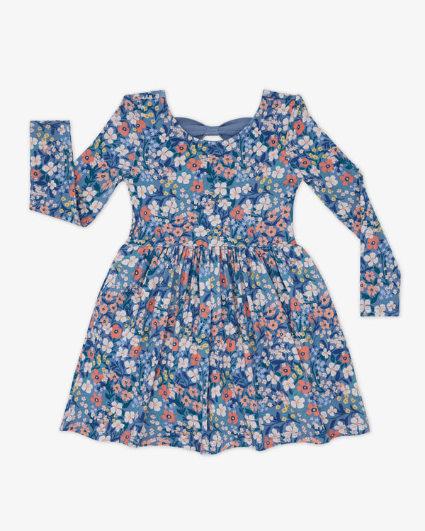 Flat lay of the Petite Petals Bow Back Skater Dress