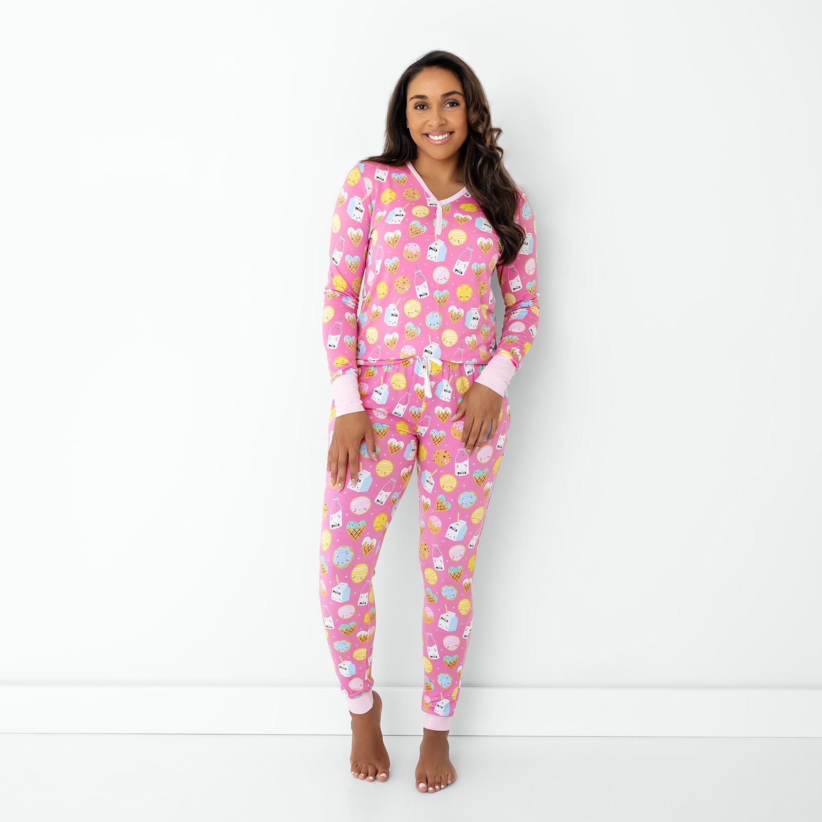 Standing woman wearing the Pink Cookies & Milk Women's Pajama Pants and top