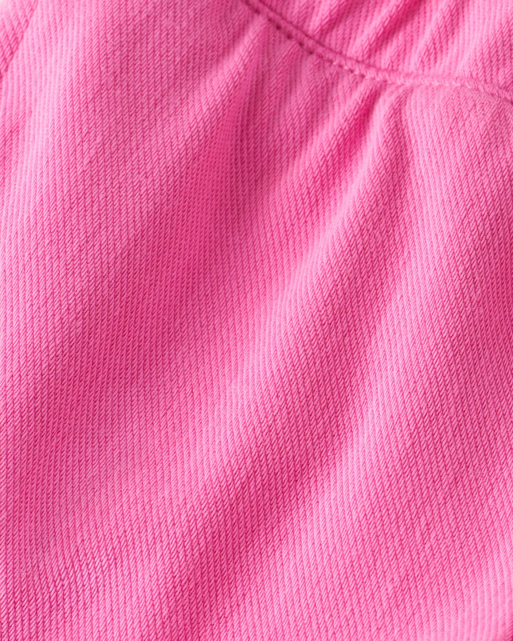 Close up of the Pink Spark Denim fabric