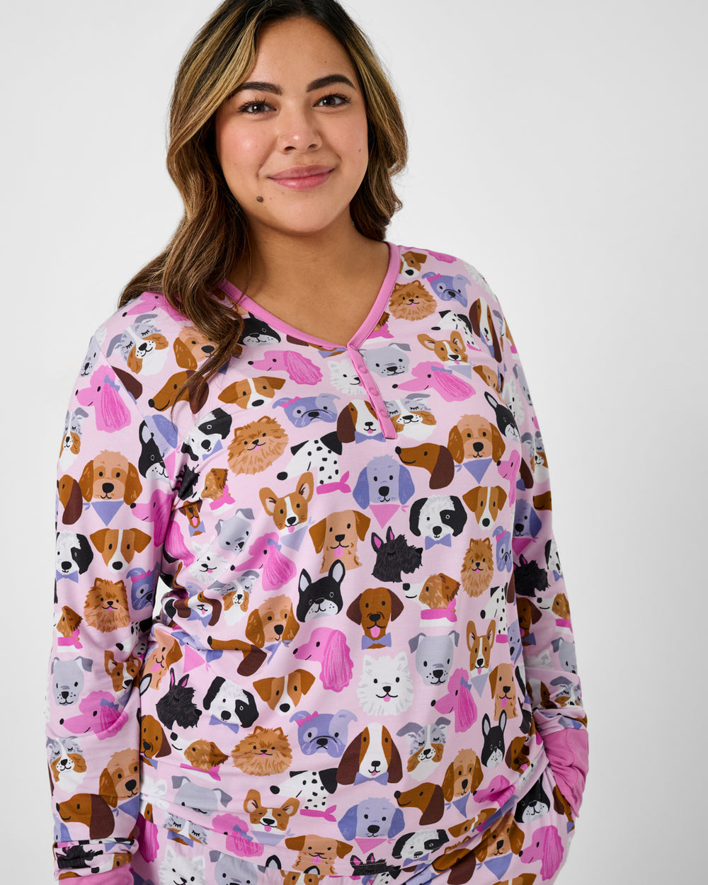 Woman wearing the Pink Puppy Parade Women's Long Sleeve Pajama Top