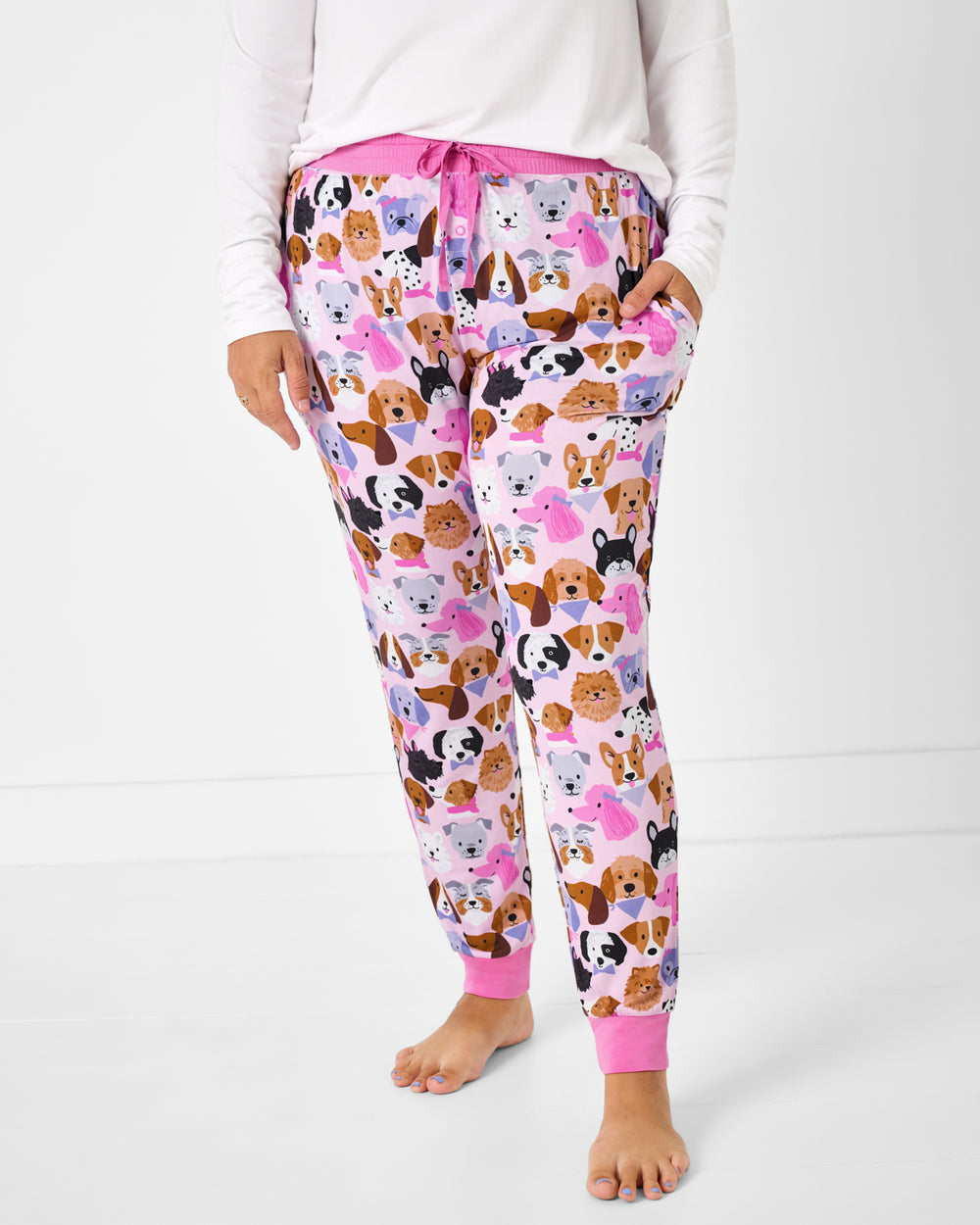 Woman wearing the Pink Puppy Parade Women's Pajama Pants