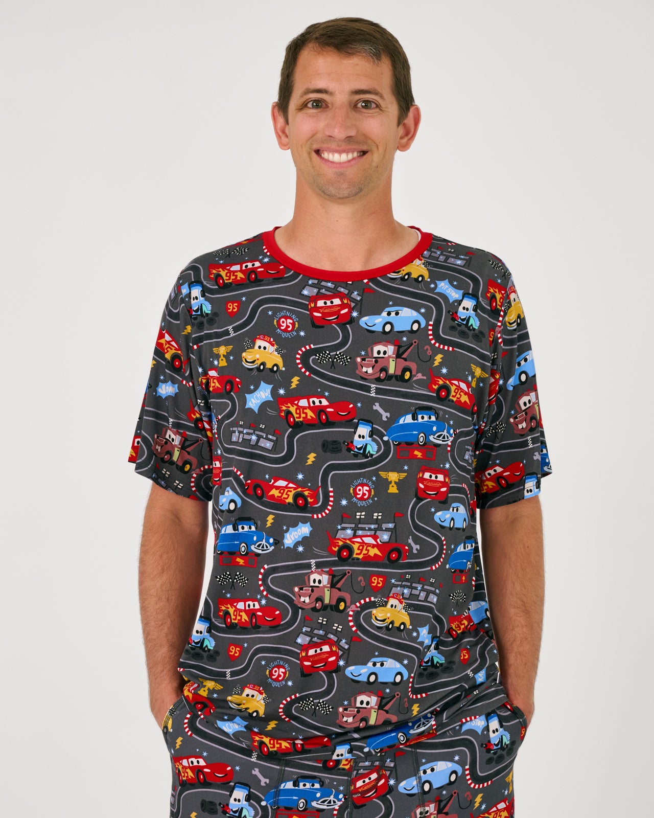 Man wearing the Disney & Pixar Piston Cup Men's Short Sleeve Pajama Top